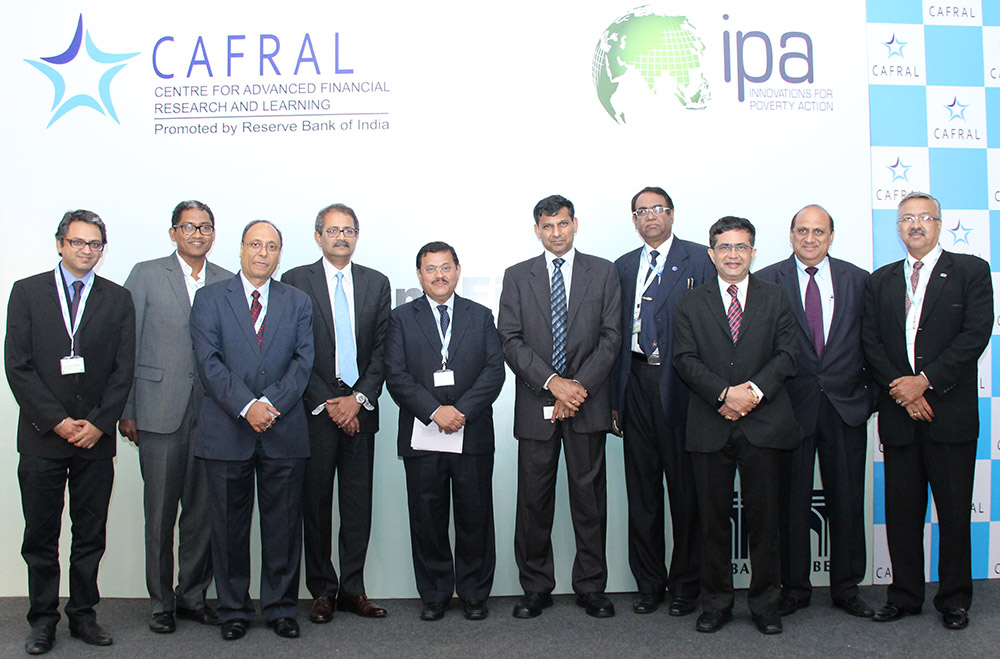 Dr. Raghuram Rajan, Governor, RBI, G Gopalakrishna, Director and Dr. N R Prabhala, Head of Research, CAFRAL with panelists and participants